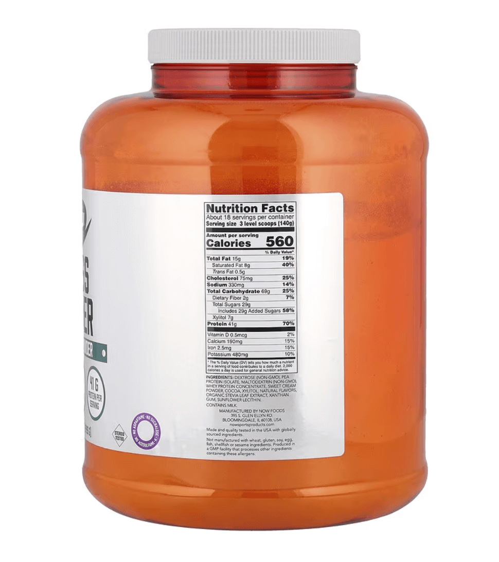 NOW® Sports Mass Gainer Powder, Creamy Chocolate, 560 calories, protein supplement, vitamins, and creatine.